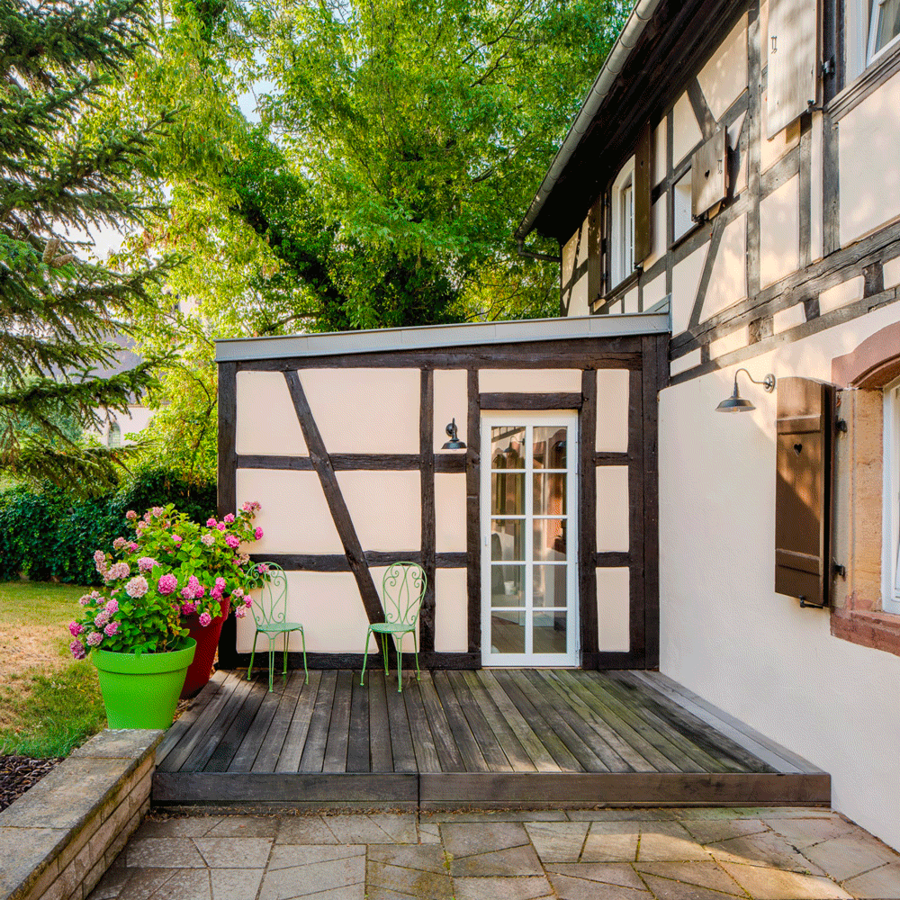 Berstett maison à colombage rénovation alsace architecte surprise adrien puzzuoli architecte extension traditionnelle mur colombage terrase bois